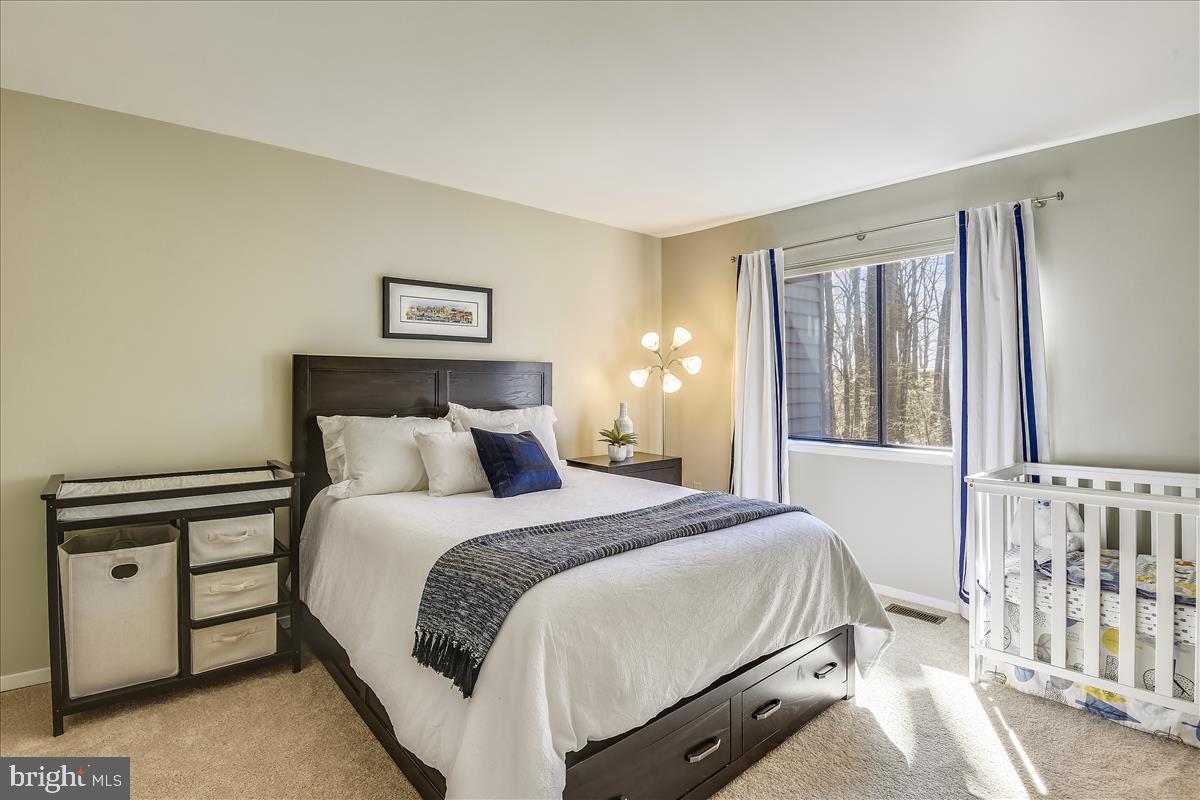 2021 Turtle Pond Drive Reston, VA 20191 - Photo 26 of 57 Guest bedroom with walk-in closet