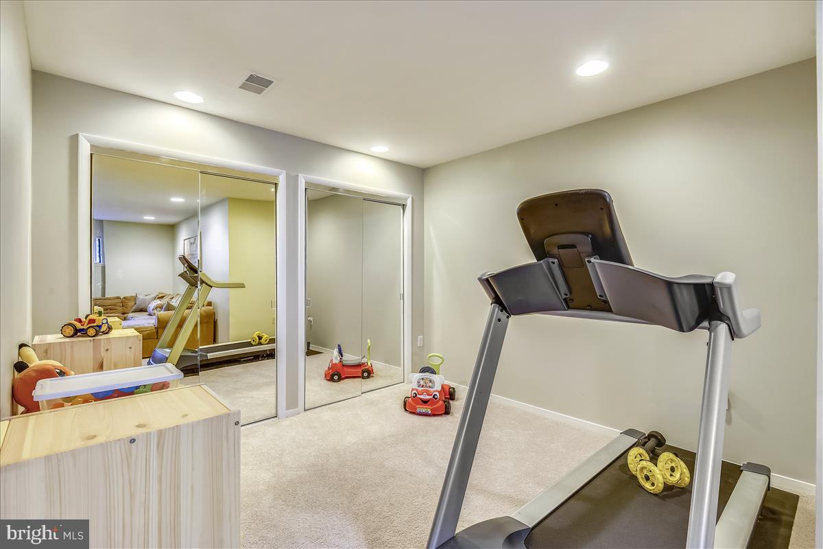 2021 Turtle Pond Drive Reston, VA 20191 - Photo 34 of 57 Fitness area adjacent to rec rm w/ mirrored doors