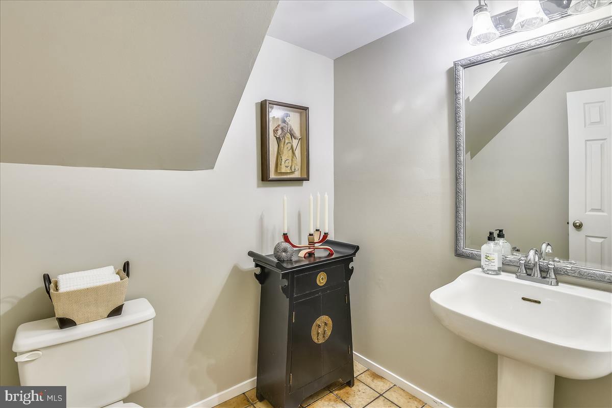 2021 Turtle Pond Drive Reston, VA 20191 - Photo 35 of 57 Guest bathroom conveniently located at entry foyer