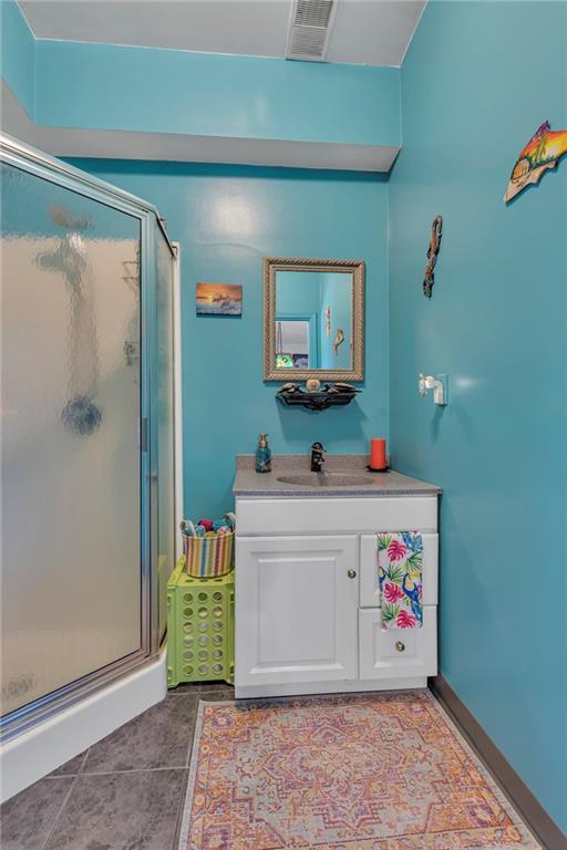 303 Sharon Grange Road Aliquippa, PA 15001 - Photo 21 of 50 Full bath located on the lower level. Perfect location for your pool parties or quiet day at the pool.