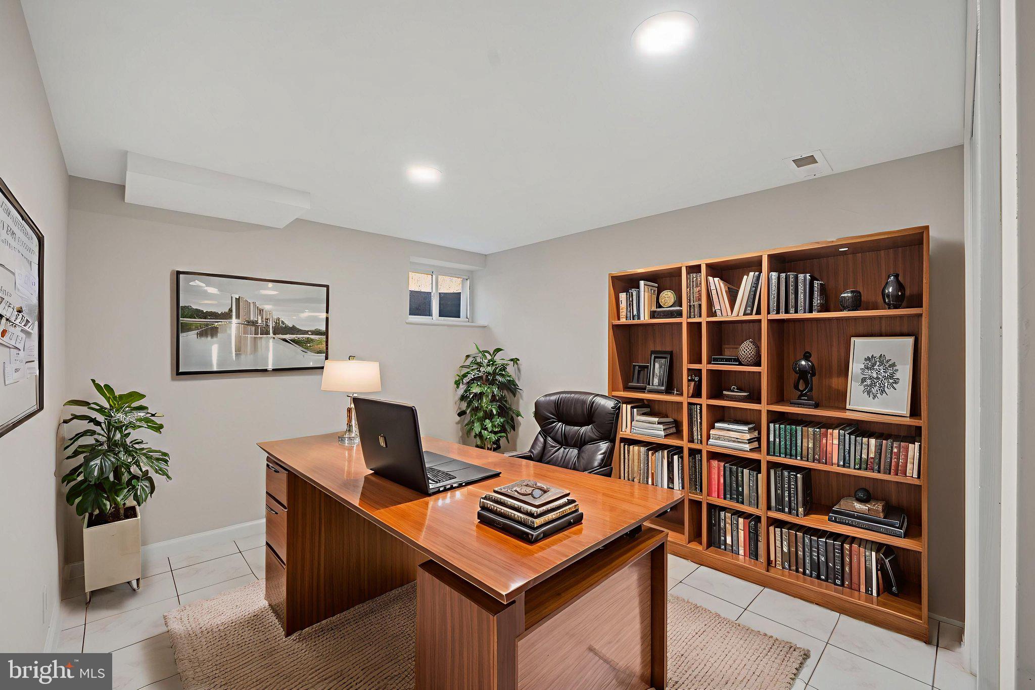 1513 Flora Lane Silver Spring, MD 20910 - Photo 39 of 49 a view of a living room with furniture and a book shelf
