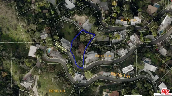 an aerial view of a highlighted house