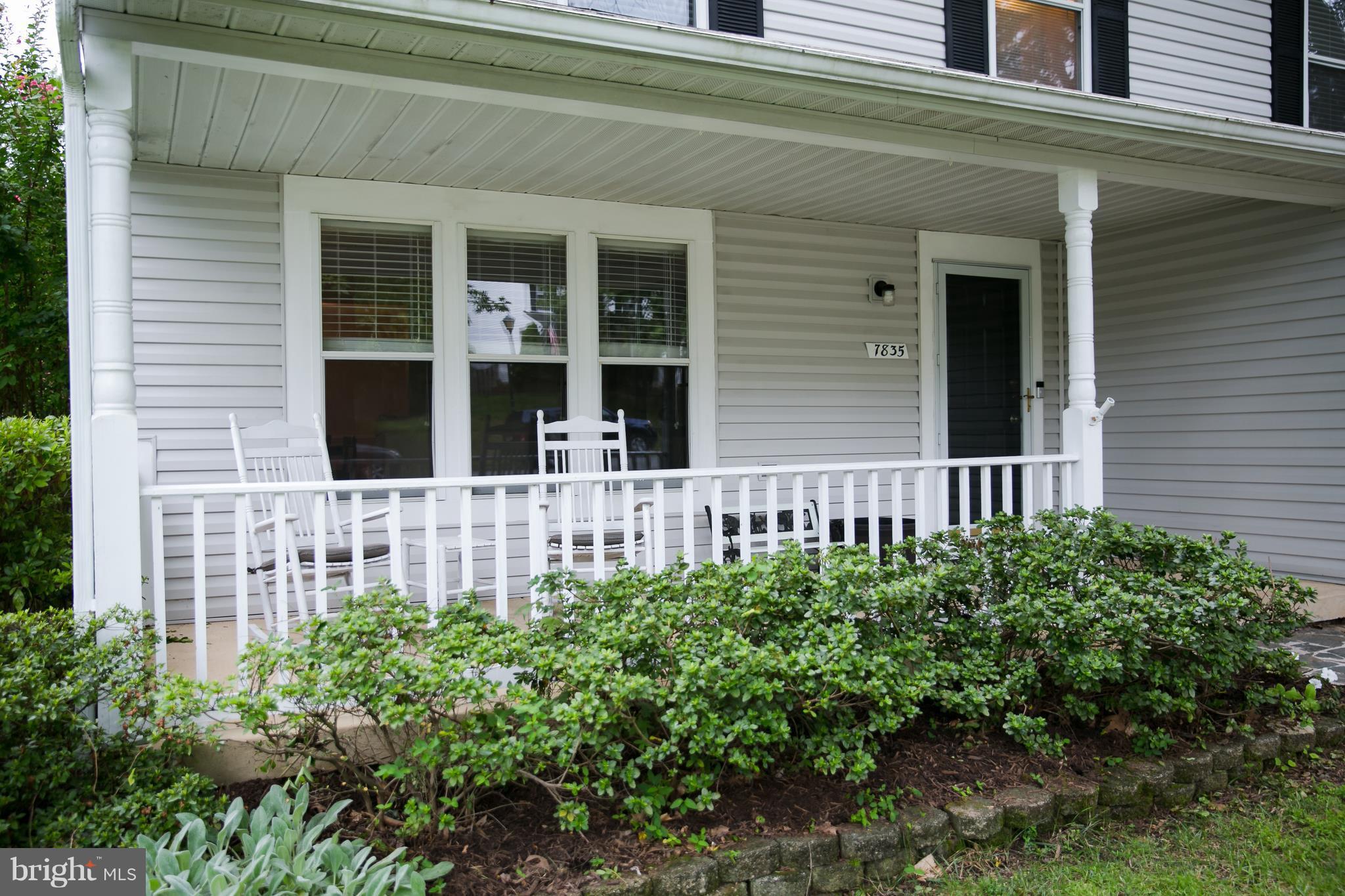 7835 Roundabout Way Springfield, VA 22153 - Photo 2 of 26 front view of a brick house