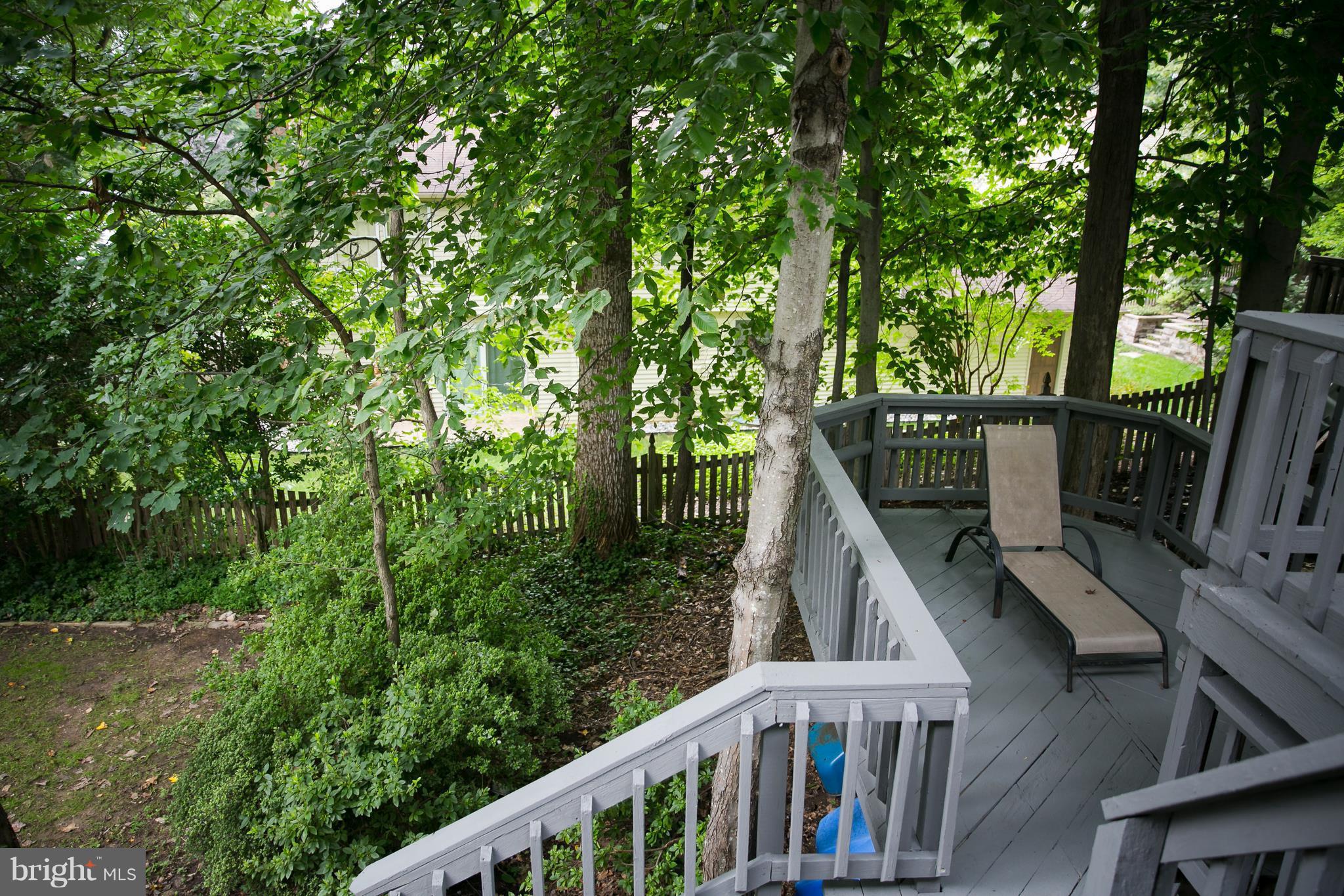 7835 Roundabout Way Springfield, VA 22153 - Photo 24 of 26 a view of a house with balcony and yard