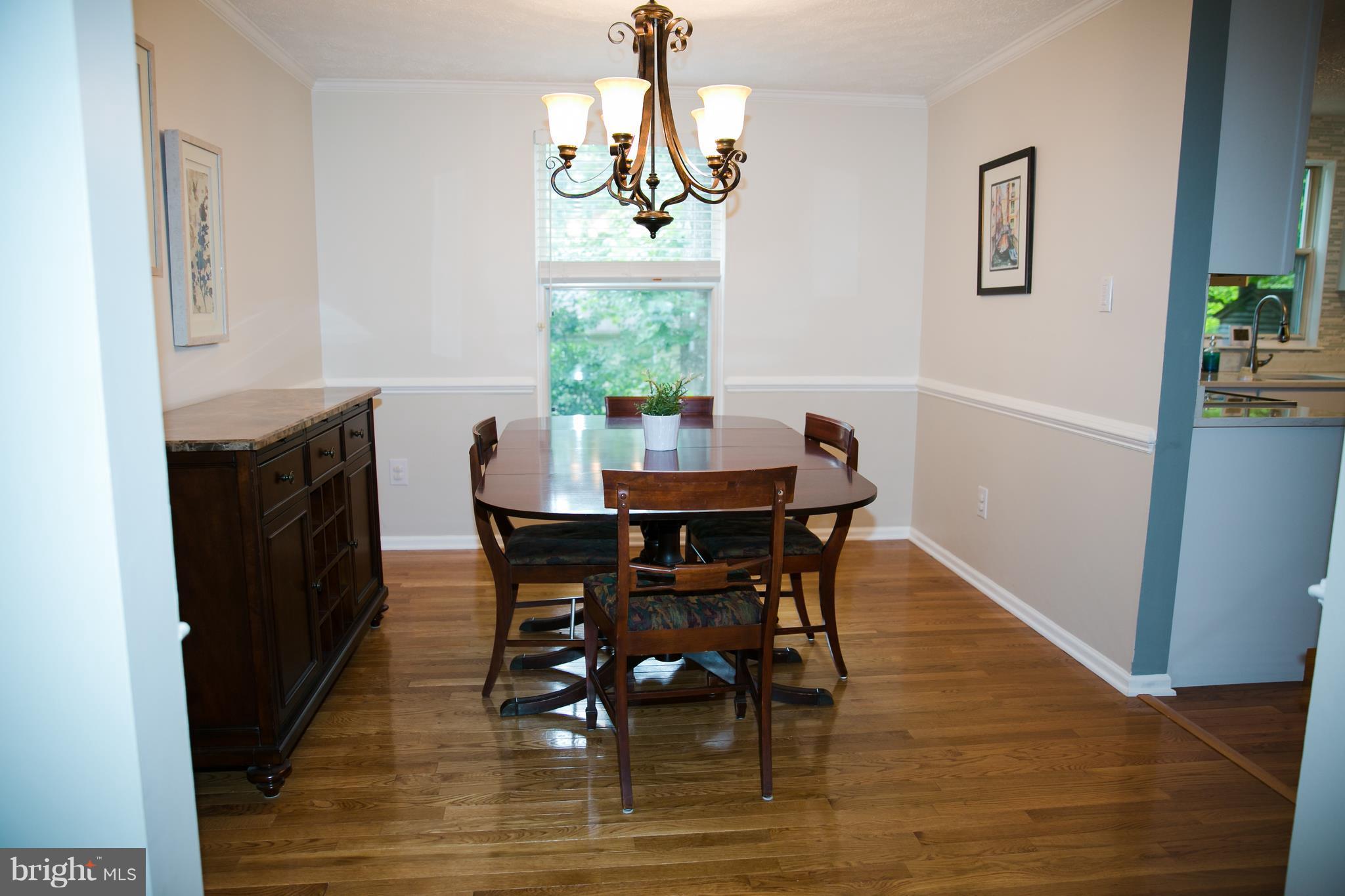 7835 Roundabout Way Springfield, VA 22153 - Photo 6 of 26 a view of a dining room with furniture and window