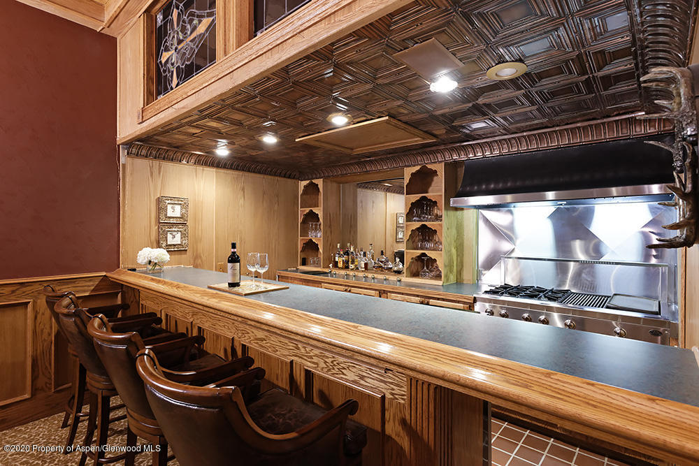 880 Buck Point Road Carbondale, CO 81623 - Photo 12 of 40 a kitchen with counter space a sink and appliances