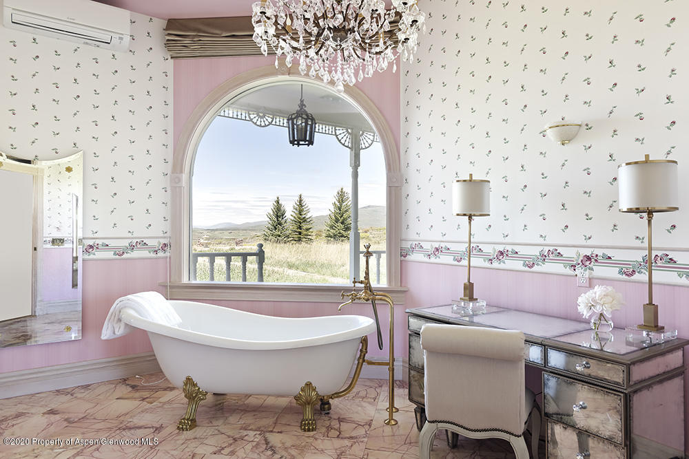 880 Buck Point Road Carbondale, CO 81623 - Photo 15 of 40 a living room with furniture and a large window