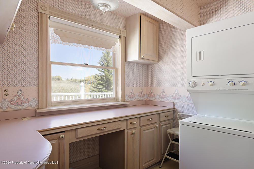 880 Buck Point Road Carbondale, CO 81623 - Photo 26 of 40 a view of a kitchen with a sink and a window
