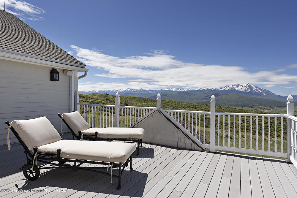 880 Buck Point Road Carbondale, CO 81623 - Photo 28 of 40 a view of a balcony with furniture