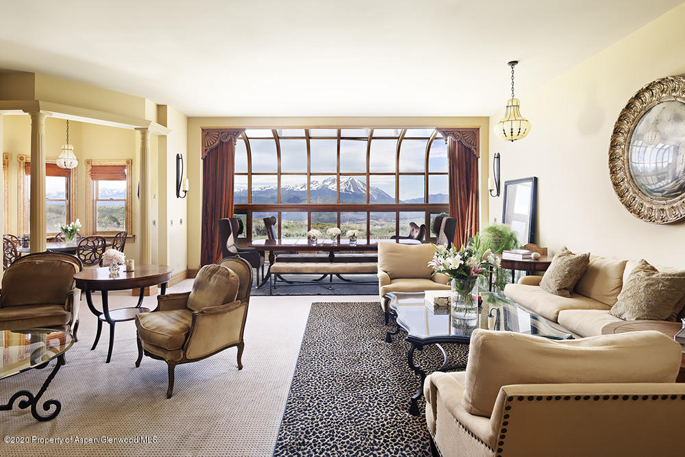 880 Buck Point Road Carbondale, CO 81623 - Photo 3 of 40 a living room with furniture and a large window