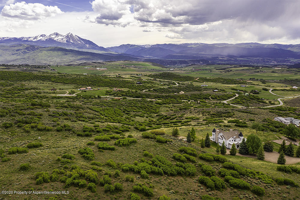 880 Buck Point Road Carbondale, CO 81623 - Photo 32 of 40 a view of an aerial view of residential houses with outdoor space and mountain view in back
