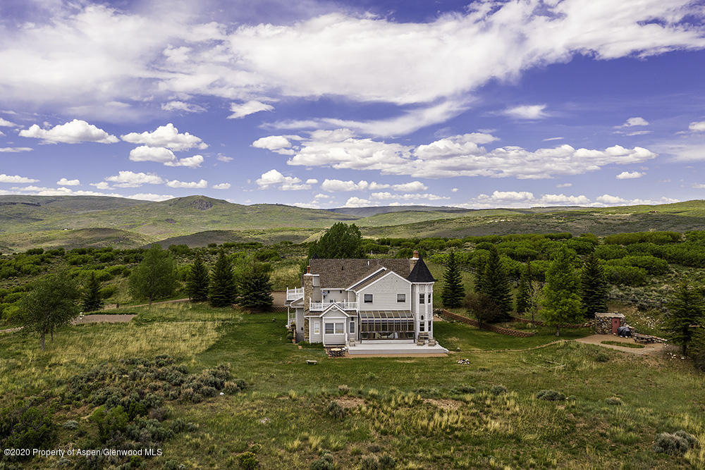 880 Buck Point Road Carbondale, CO 81623 - Photo 34 of 40 a view of a city with an ocean beach