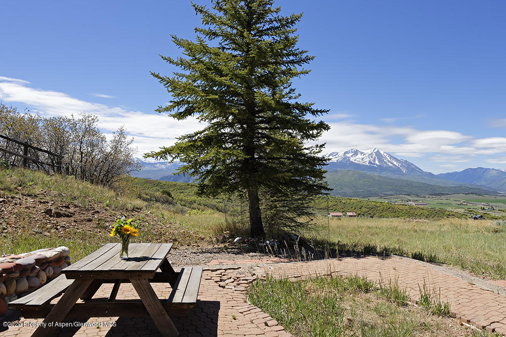 880 Buck Point Road Carbondale, CO 81623 - Photo 38 of 40 a view of a lake with a mountain