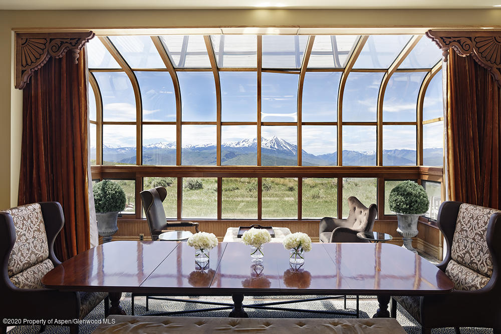 880 Buck Point Road Carbondale, CO 81623 - Photo 6 of 40 a living room with furniture and large windows