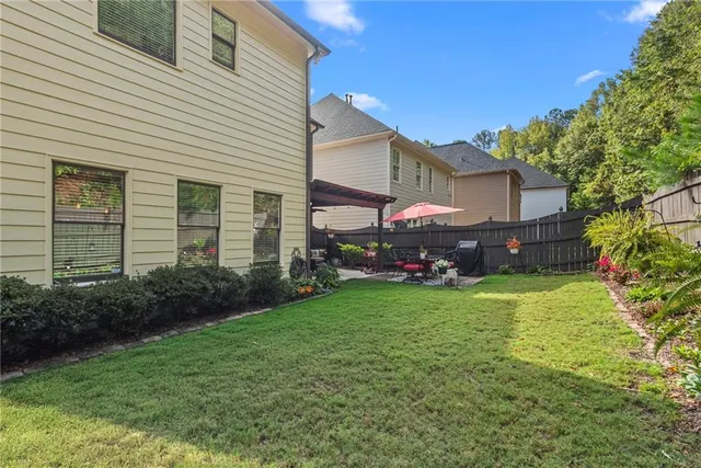 a house view with a garden space