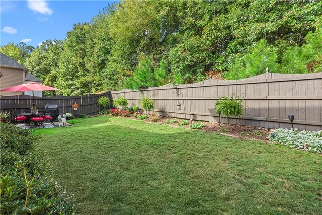 a view of a backyard with a garden