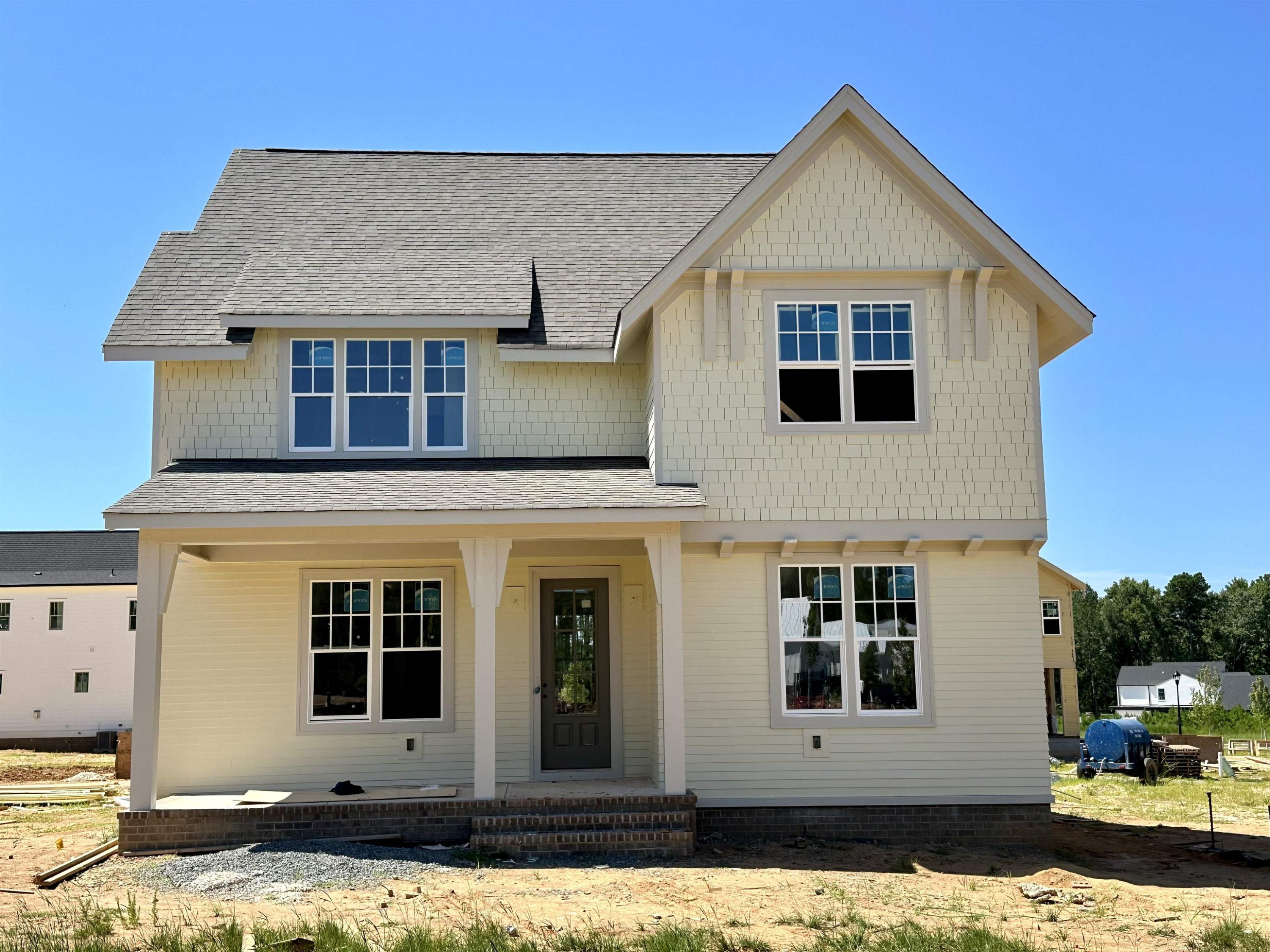 505 Whitehall Circle Durham, NC 27713 - Photo 1 of 1 a view of a white house with large windows