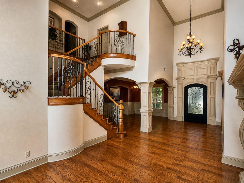 7005 Peter's Path Colleyville, TX 76034 - Photo 3 of 40 a view of entryway and hall with wooden floor