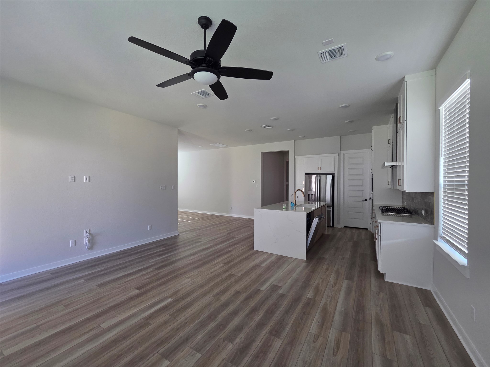 332 Marisol Bend Georgetown, TX 78626 - Photo 31 of 31 a living room with furniture and a wooden floor