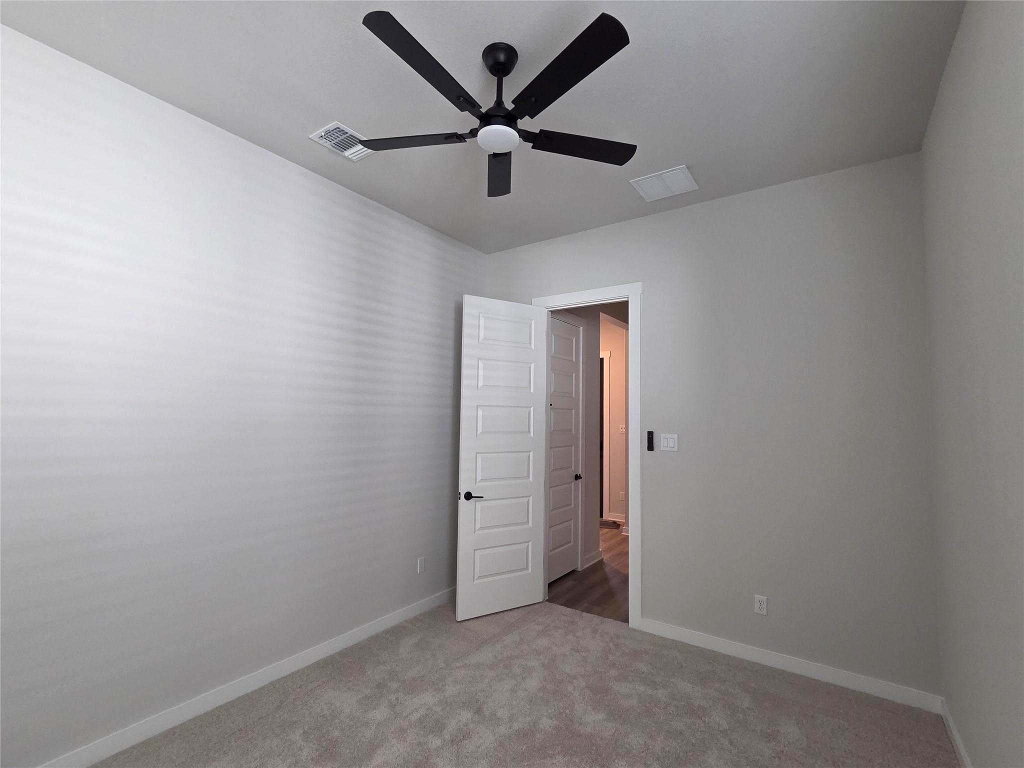 332 Marisol Bend Georgetown, TX 78626 - Photo 11 of 31 an empty room with closet and a ceiling fan