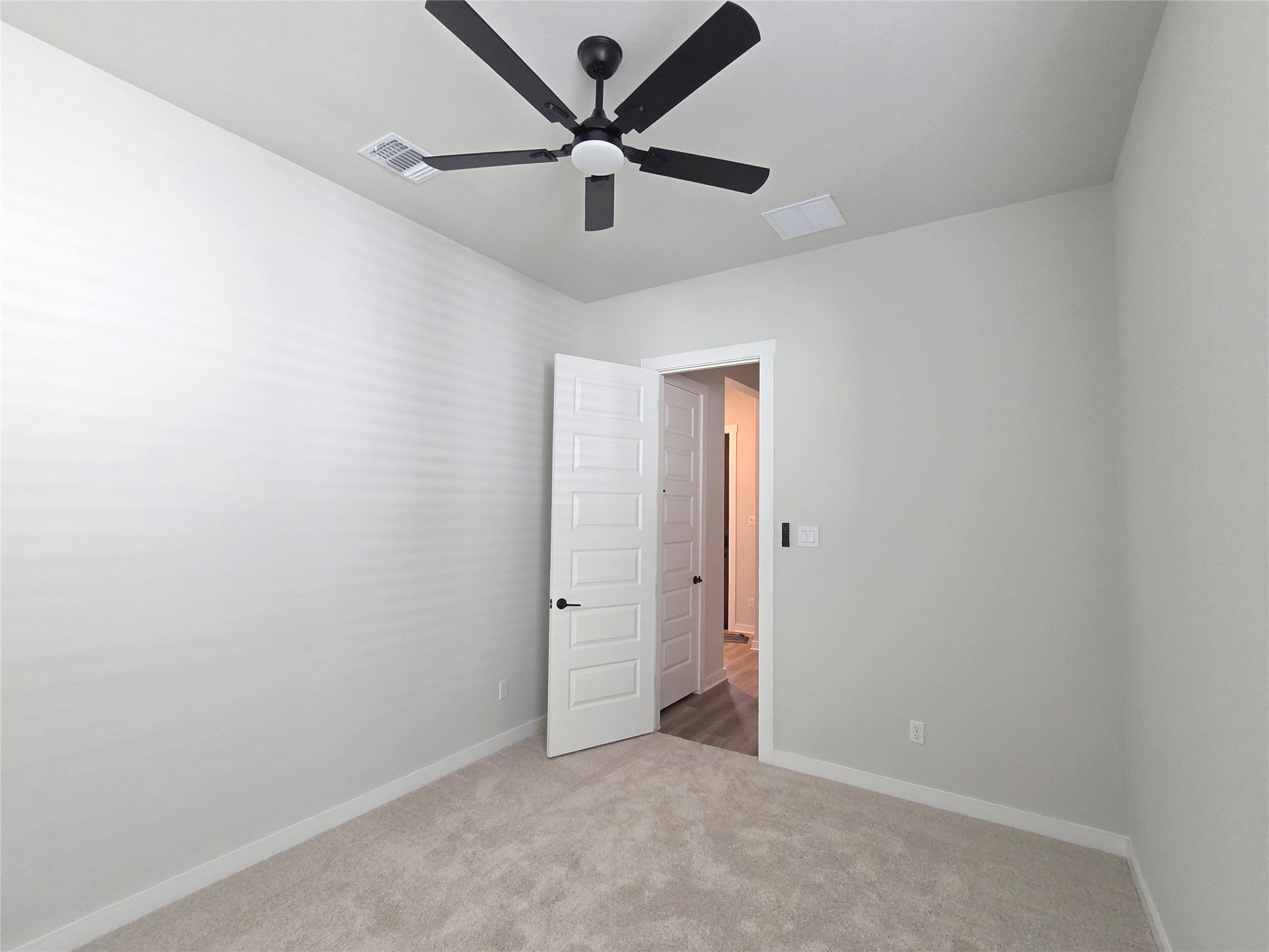 332 Marisol Bend Georgetown, TX 78626 - Photo 12 of 31 an empty room with a ceiling fan and a ceiling fan