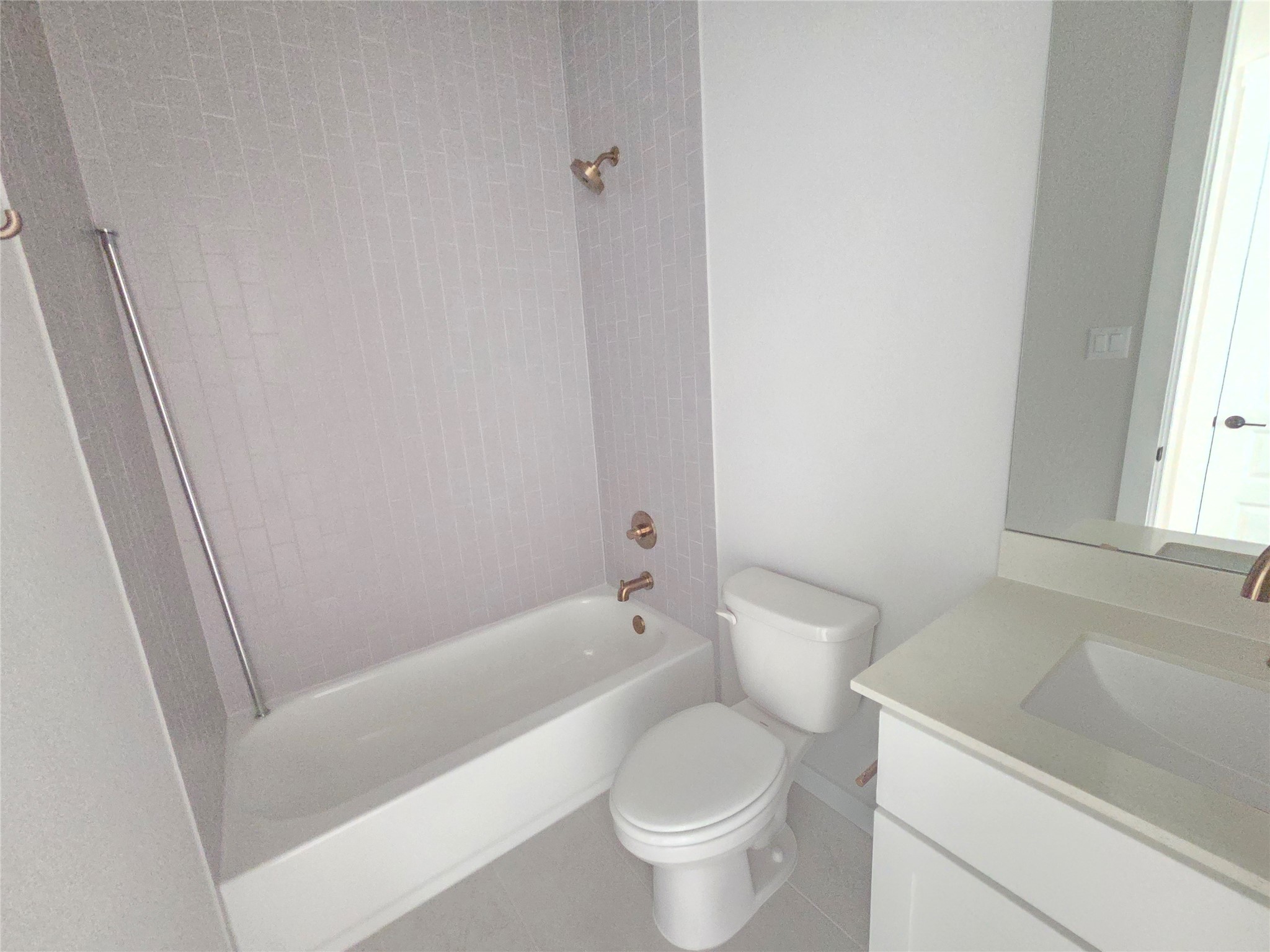 332 Marisol Bend Georgetown, TX 78626 - Photo 15 of 31 a white toilet sitting next to a bath tub