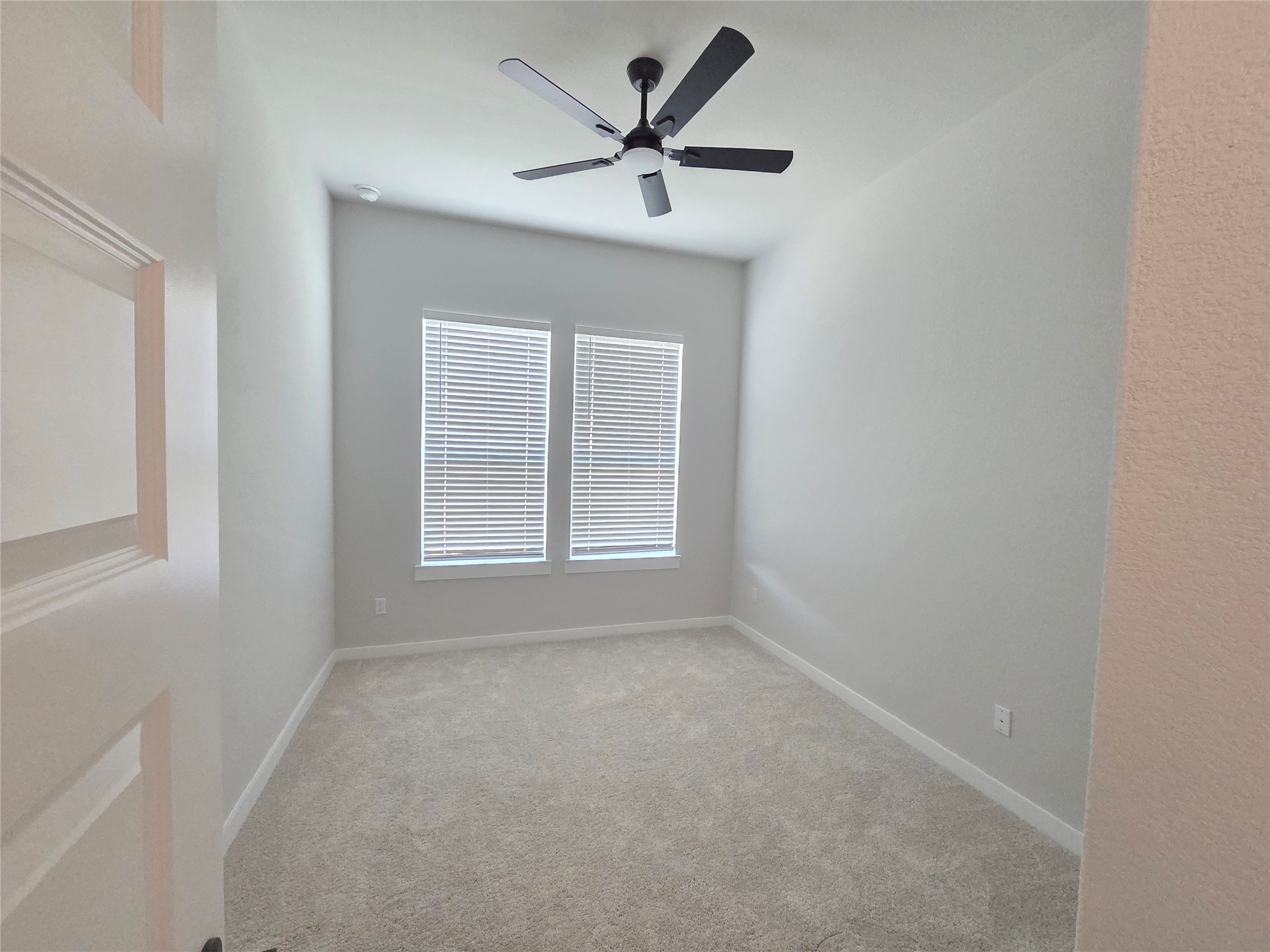 332 Marisol Bend Georgetown, TX 78626 - Photo 16 of 31 a view of a livingroom with a ceiling fan and window