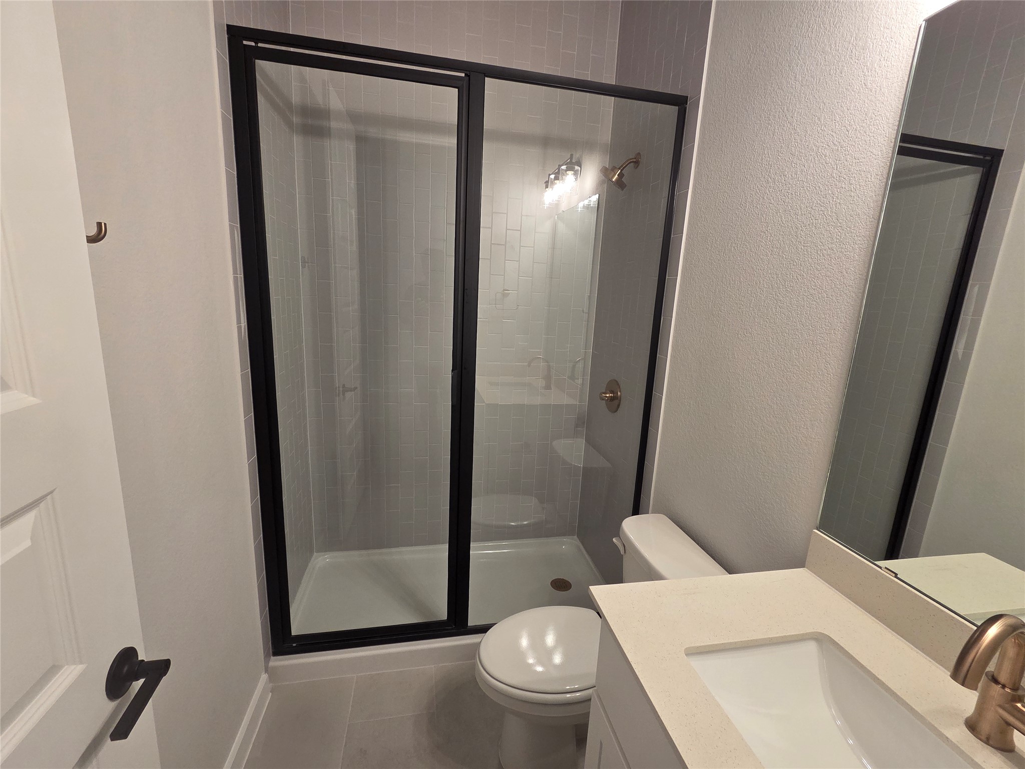 332 Marisol Bend Georgetown, TX 78626 - Photo 19 of 31 a bathroom with a shower and a toilet