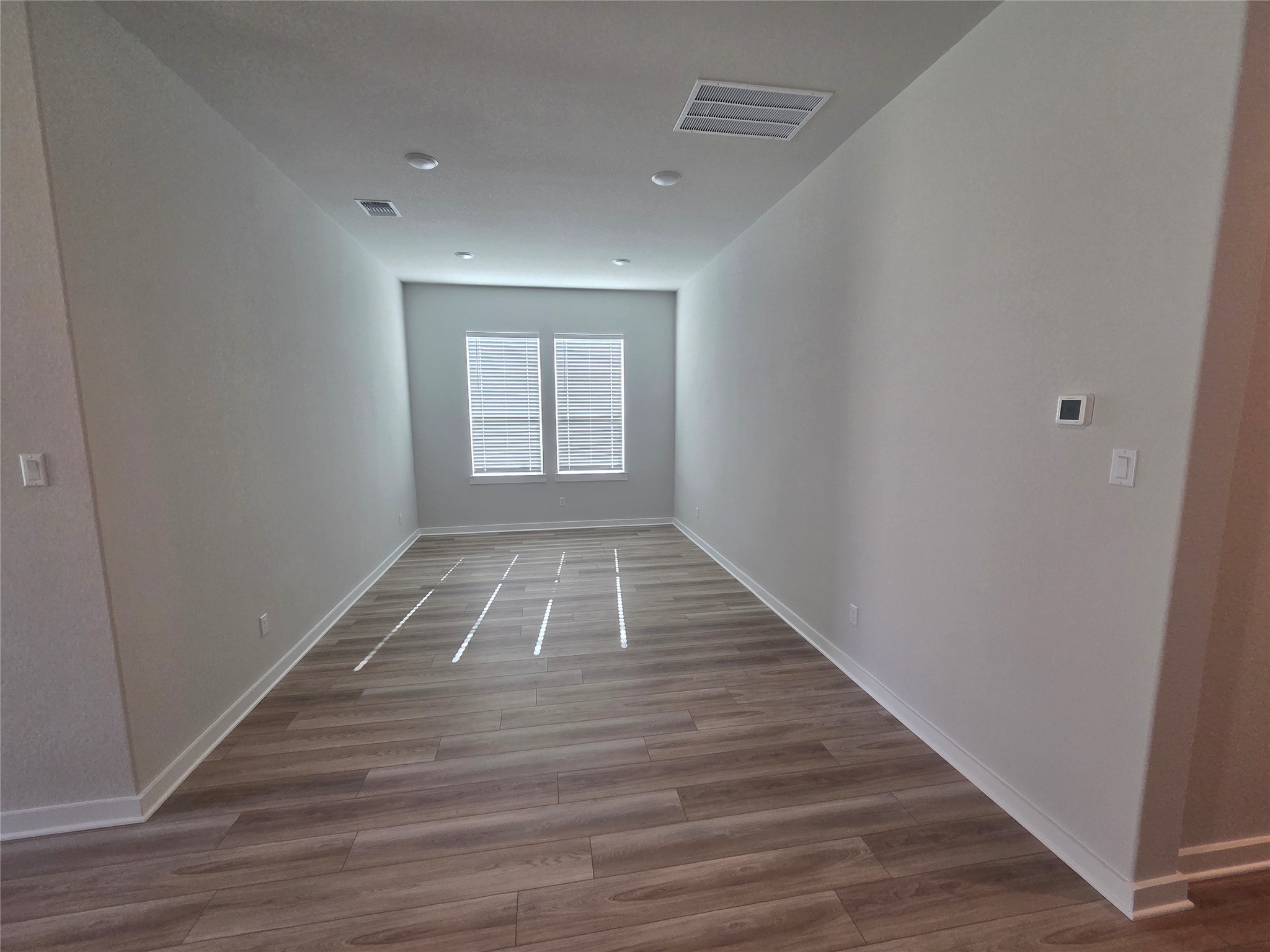 332 Marisol Bend Georgetown, TX 78626 - Photo 24 of 31 a view of empty room with wooden floor
