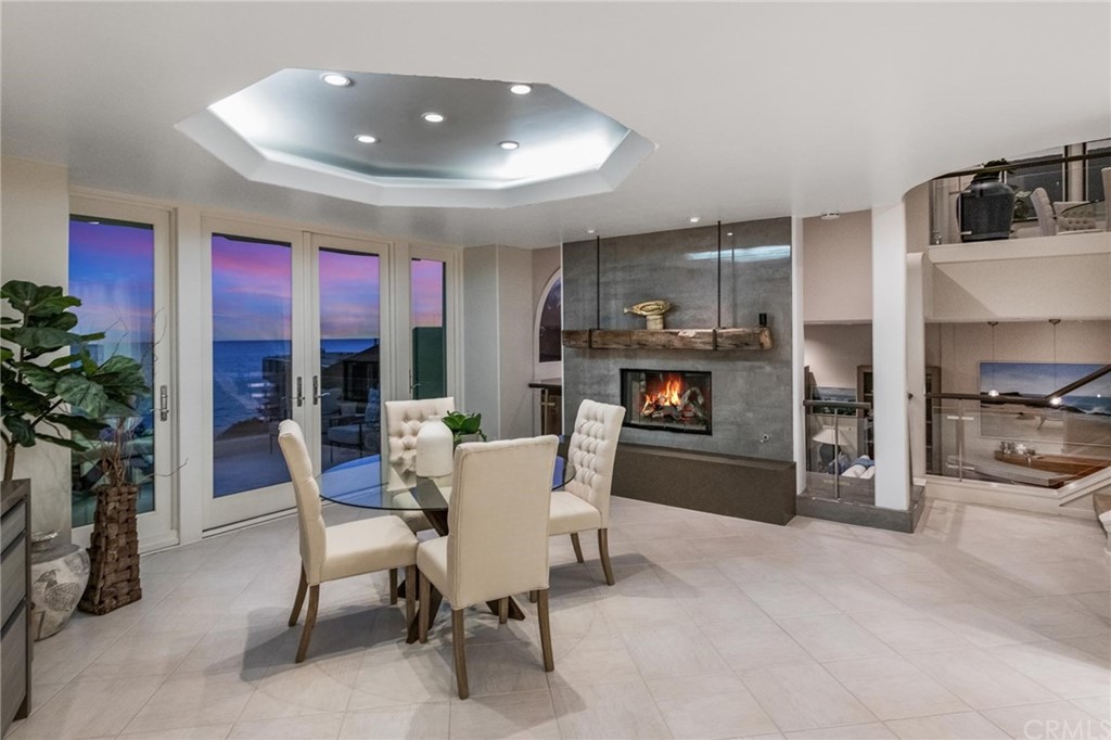 31597 Table Rock Drive Laguna Beach, CA 92651 - Photo 11 of 75 a view of a dining room with furniture and a chandelier