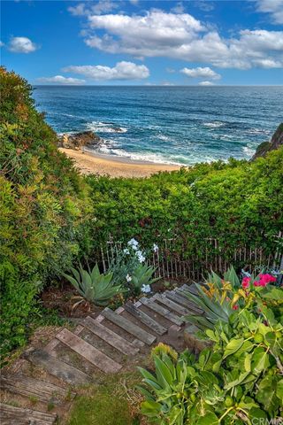 a dining room with furniture and a fireplace