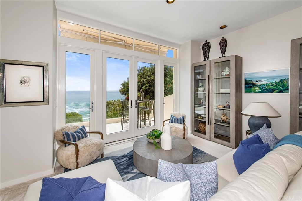 31597 Table Rock Drive Laguna Beach, CA 92651 - Photo 54 of 75 a living room with furniture and a large window