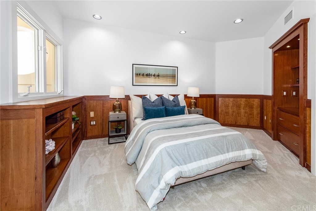 31597 Table Rock Drive Laguna Beach, CA 92651 - Photo 64 of 75 a bedroom with a bed and wooden floor