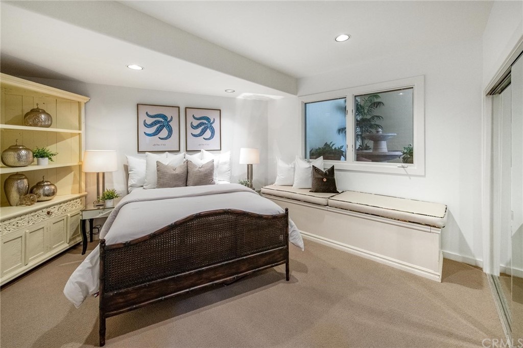 31597 Table Rock Drive Laguna Beach, CA 92651 - Photo 66 of 75 a bedroom with a bed and a cabinets