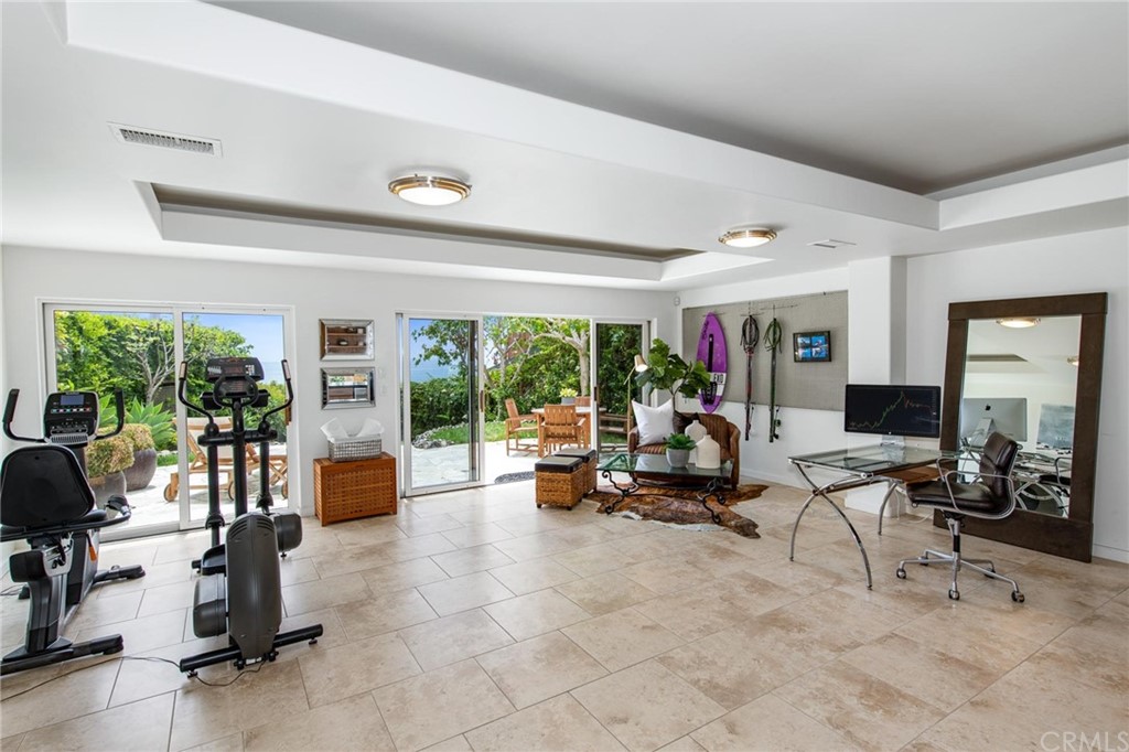31597 Table Rock Drive Laguna Beach, CA 92651 - Photo 67 of 75 a view of a livingroom with lounge chair and a large window
