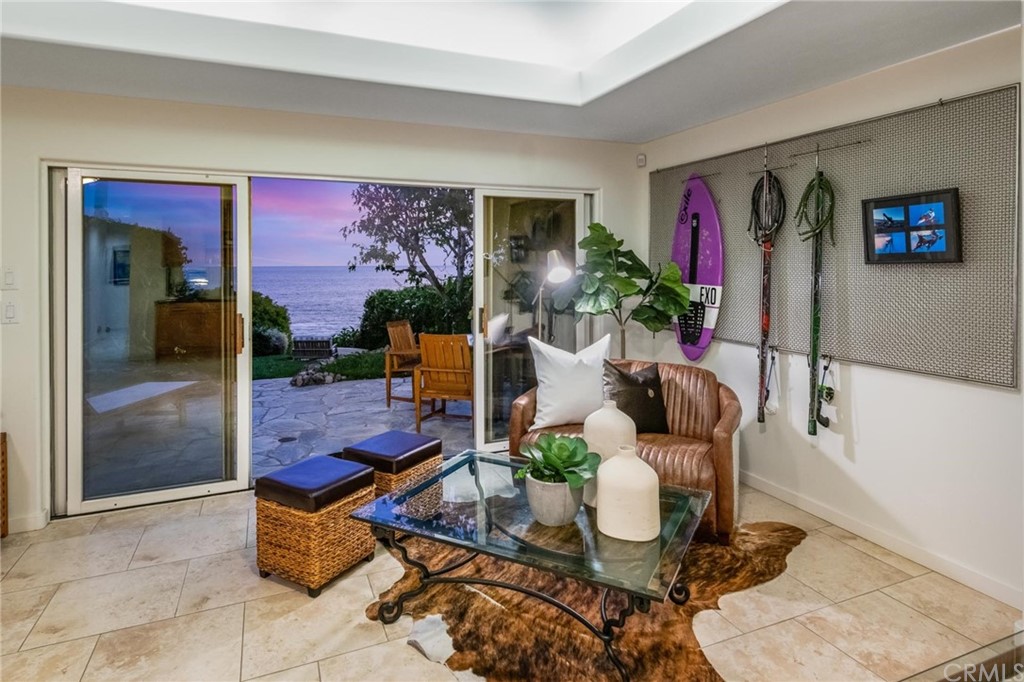 31597 Table Rock Drive Laguna Beach, CA 92651 - Photo 69 of 75 a living room with furniture and a potted plant