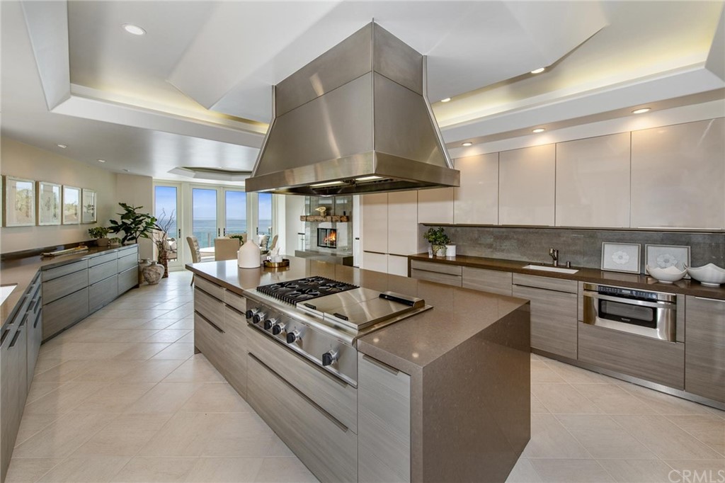 31597 Table Rock Drive Laguna Beach, CA 92651 - Photo 10 of 75 a kitchen with stainless steel appliances a stove a sink and a refrigerator
