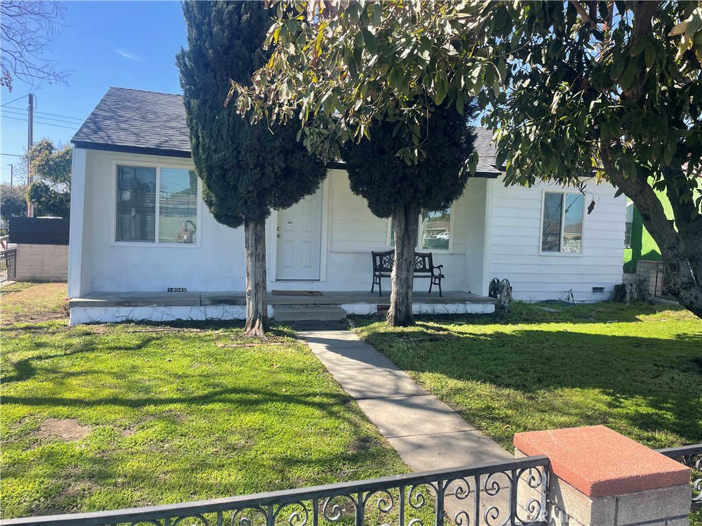 14049 Studebaker Road Norwalk, CA 90650 - Photo 1 of 1 a house view with a garden space
