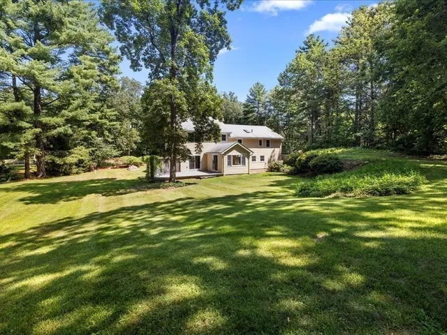 a swimming pool that is in the garden