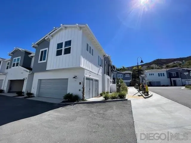 a view of a street with houses