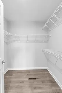 a view of an empty walk in closet