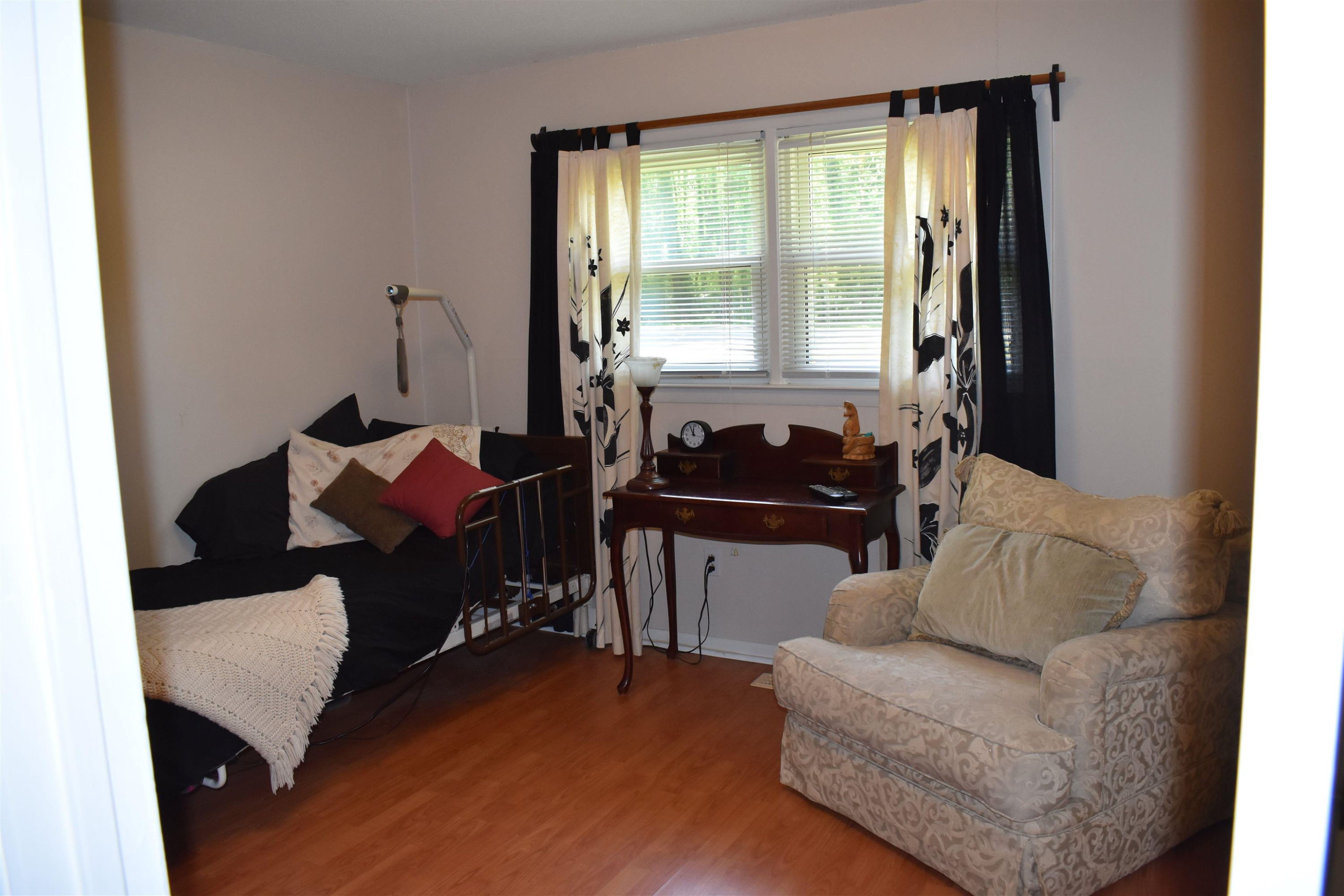 512 Grovemont Road Raleigh, NC 27603 - Photo 14 of 23 BR 2 w/Pergo floor covering, double windows & 2 door closet & ceiling light! Bedroom 2