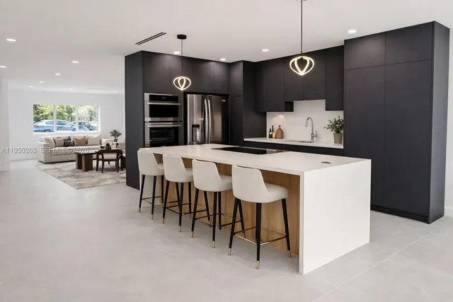 a view of a kitchen with a sink