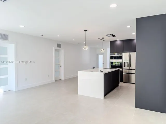 a bathroom with a shower and a toilet