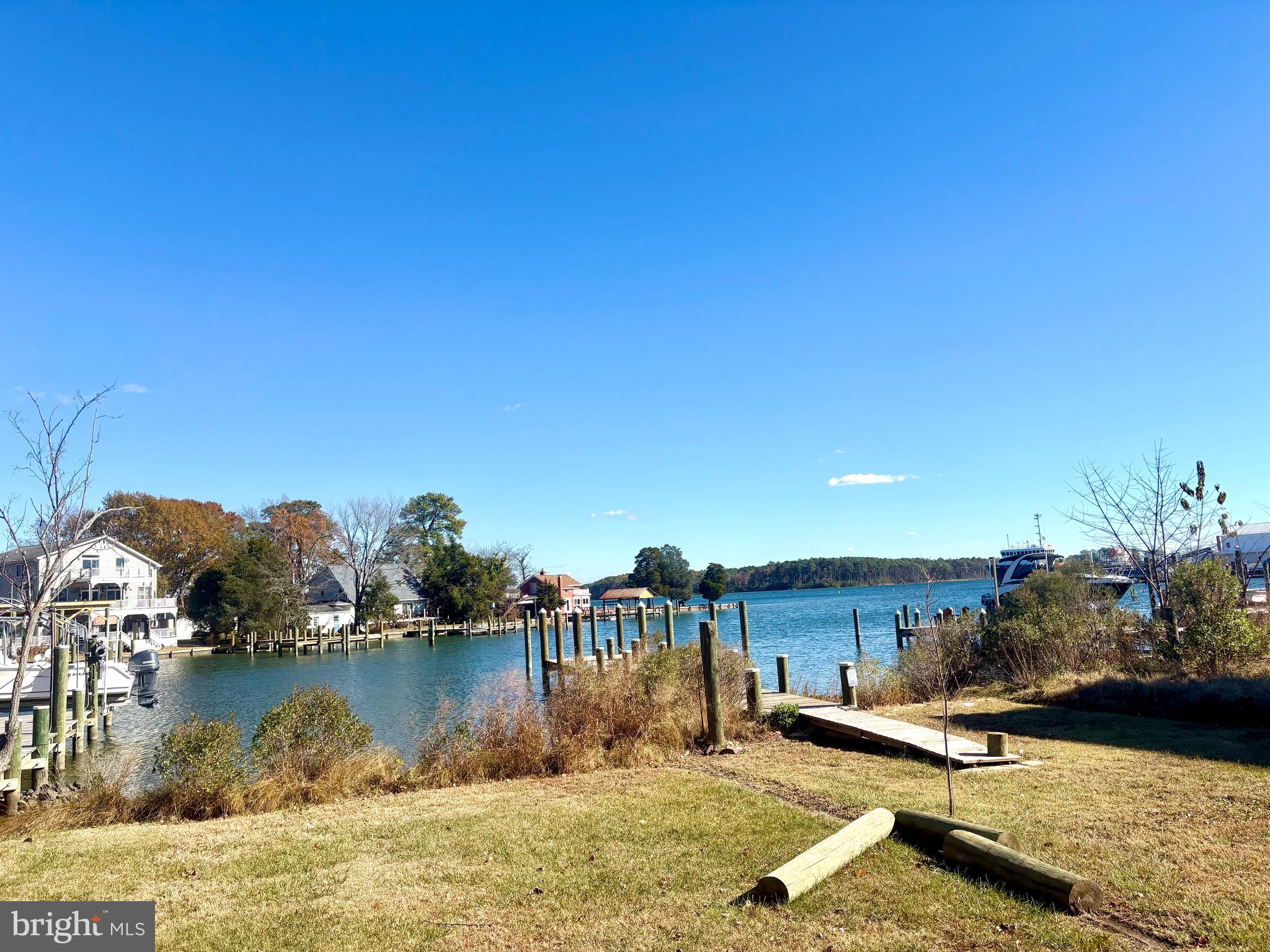 45394 Walnut Street Piney Point, MD 20674 - Photo 7 of 23 a view of a lake with houses