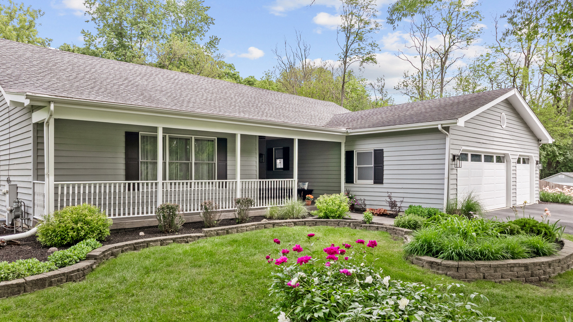 28W140 Mack Road Wheaton, IL 60189 - Photo 41 of 48 a front view of a house with garden and porch