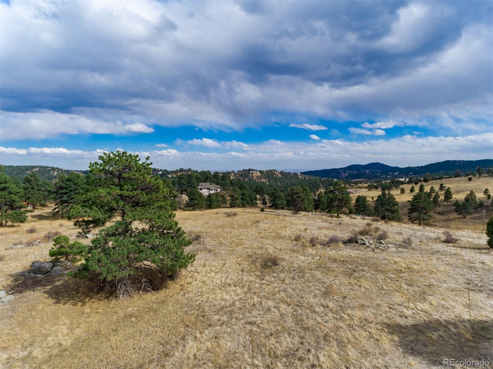0 Mistletoe Road Golden, CO 80401 - Photo 21 of 30 a view of a lake with a beach