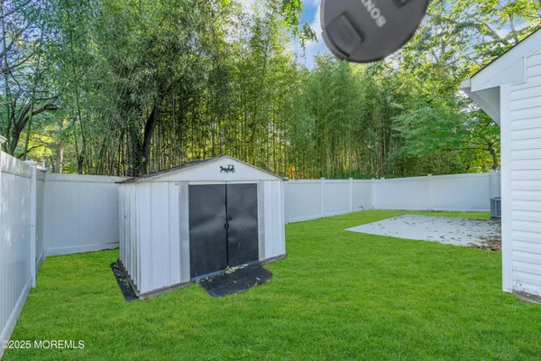a backyard of a house with lots of green space