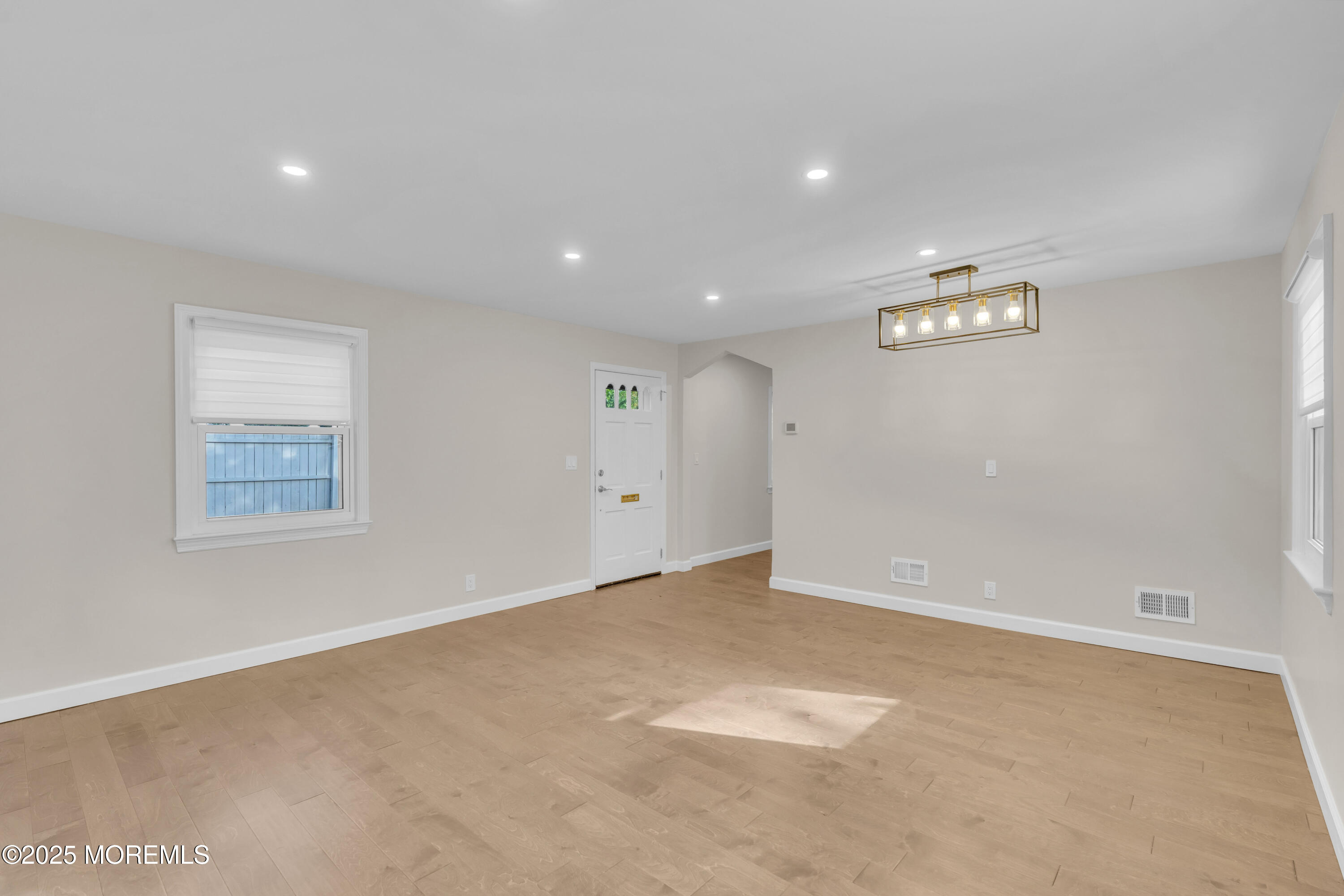 185 Elmwood Road Oakhurst, NJ 07755 - Photo 5 of 19 an empty room with windows