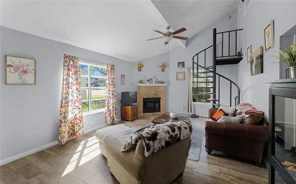 a bedroom with furniture and a fireplace
